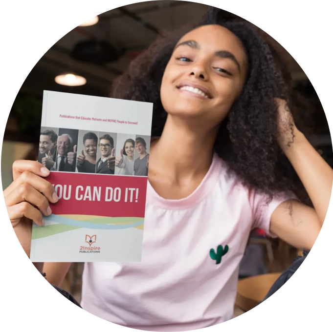 Confident young woman holding a 'You Can Do It!' guide from 2Inspire Publications — symbolizing career development and youth empowerment.